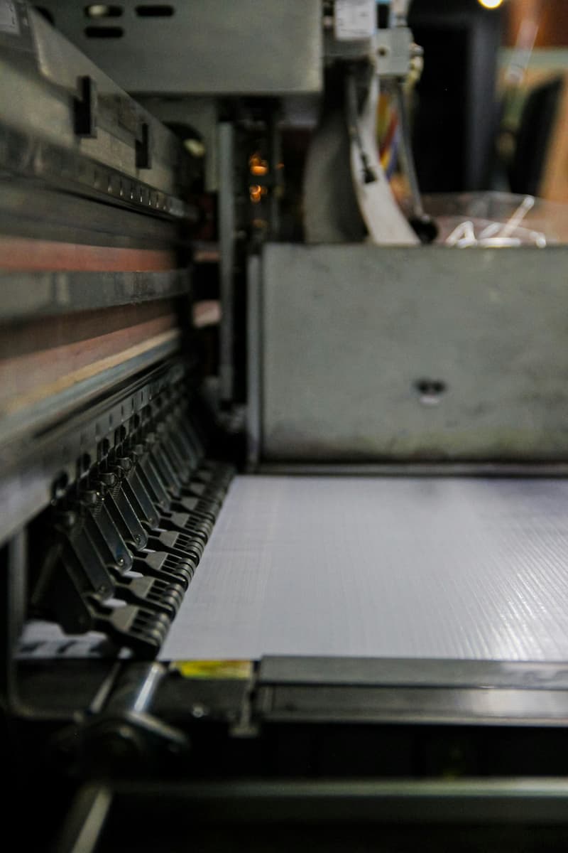 Large format printer printing a vehicle wrap at Three Palm Designs